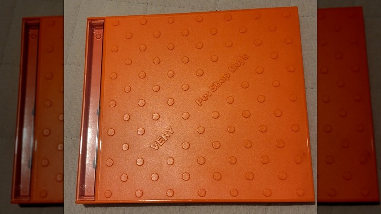 L'animalerie pour garçons "Très" LP avec une couverture orange de type Lego